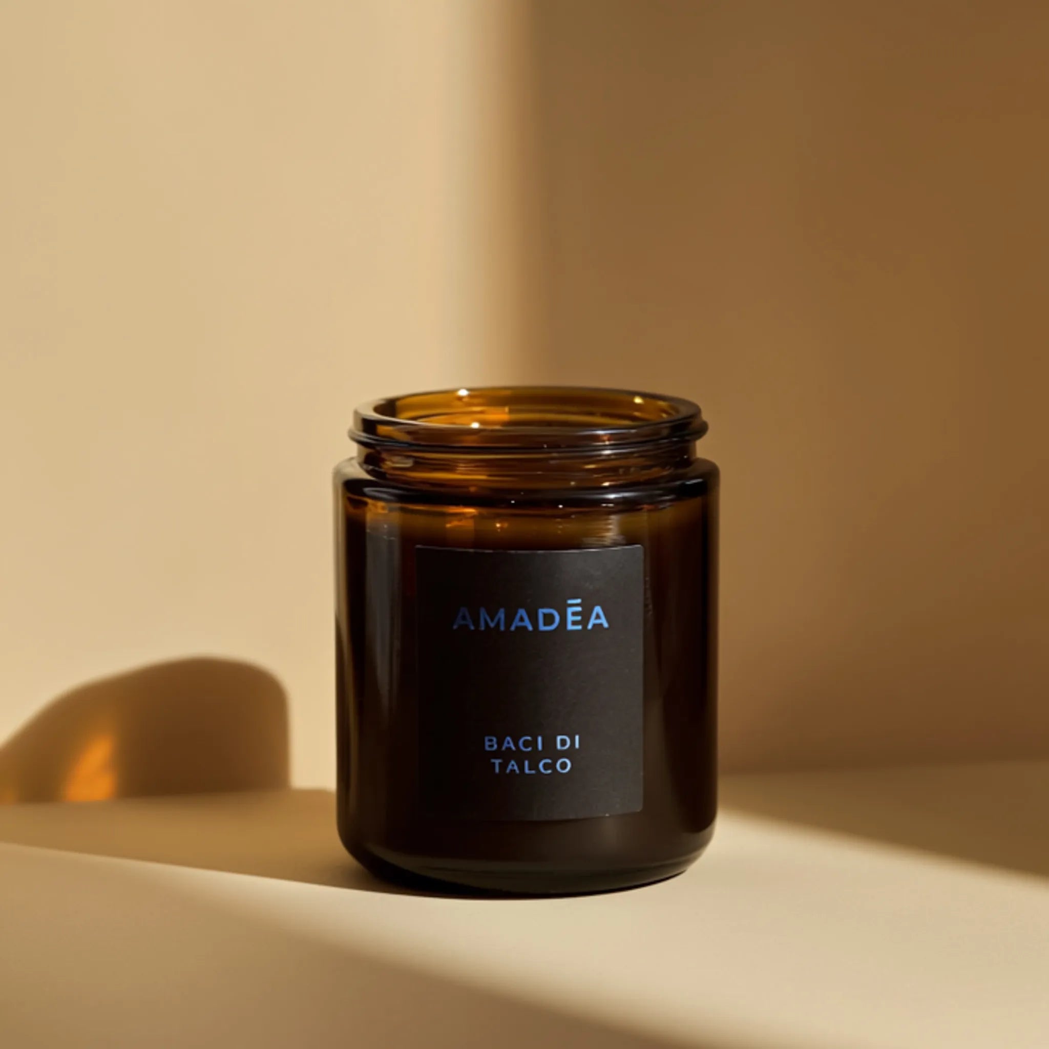 Candela "Baci di Talco" - profumata e mangiaodori